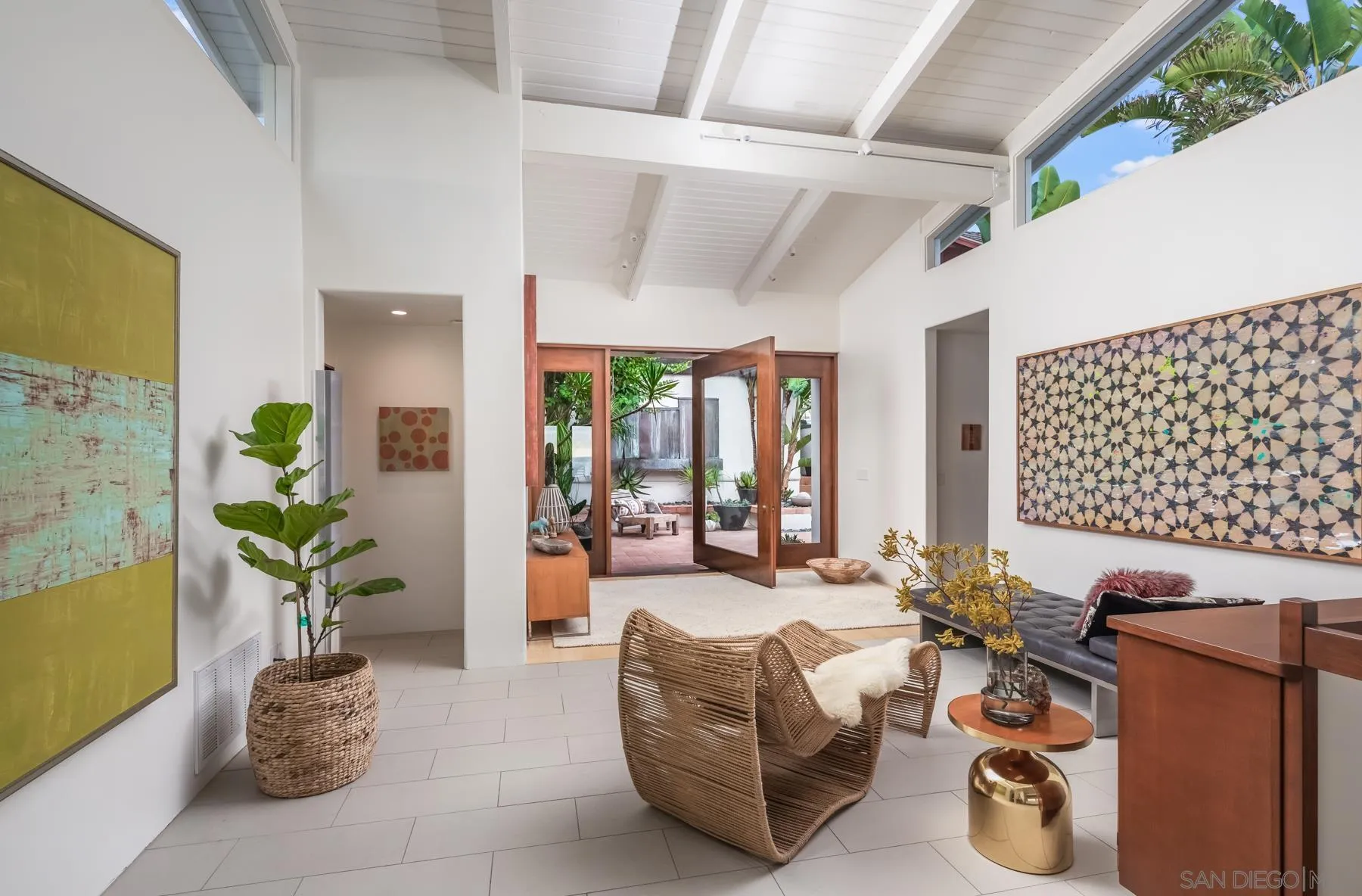 1370 Neptune Avenue Encinitas, CA 92024 - Photo 17 of 52 a living room with furniture rug and window