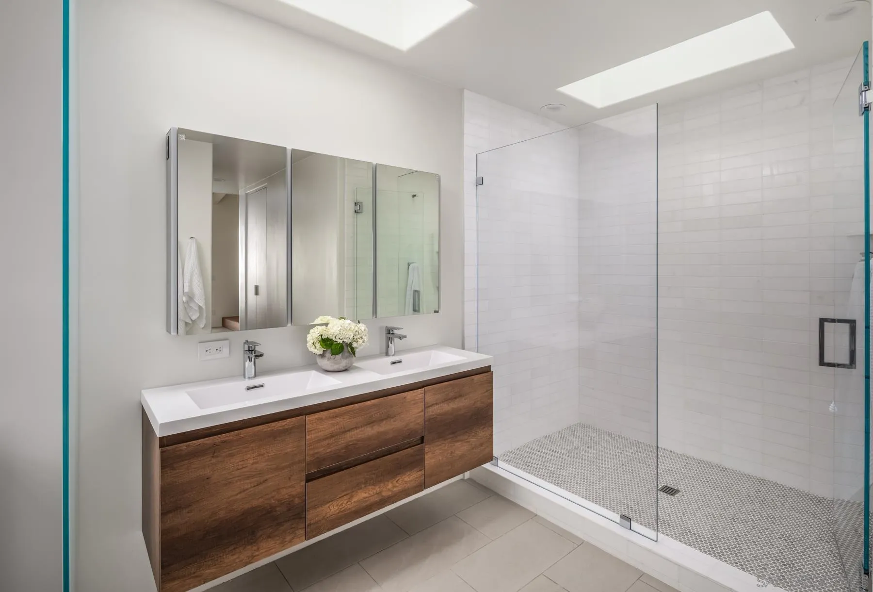 1370 Neptune Avenue Encinitas, CA 92024 - Photo 22 of 52 a en suite bathroom with a granite countertop sink and a mirror