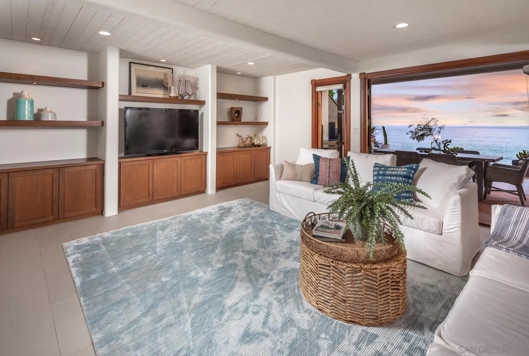 1370 Neptune Avenue Encinitas, CA 92024 - Photo 36 of 52 a living room with furniture and a large window