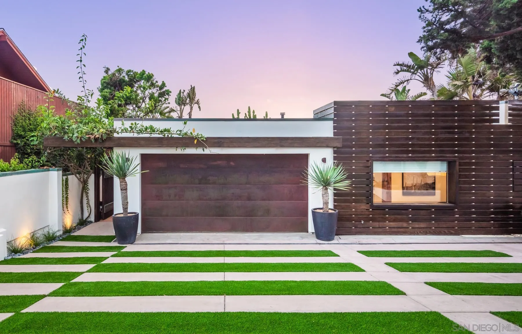 1370 Neptune Avenue Encinitas, CA 92024 - Photo 7 of 52 a front view of a house with a yard