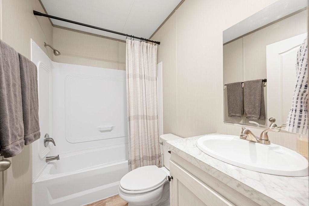 271 Clements Way Fruita, CO 81521 - Photo 15 of 26 a bathroom with a sink toilet and shower
