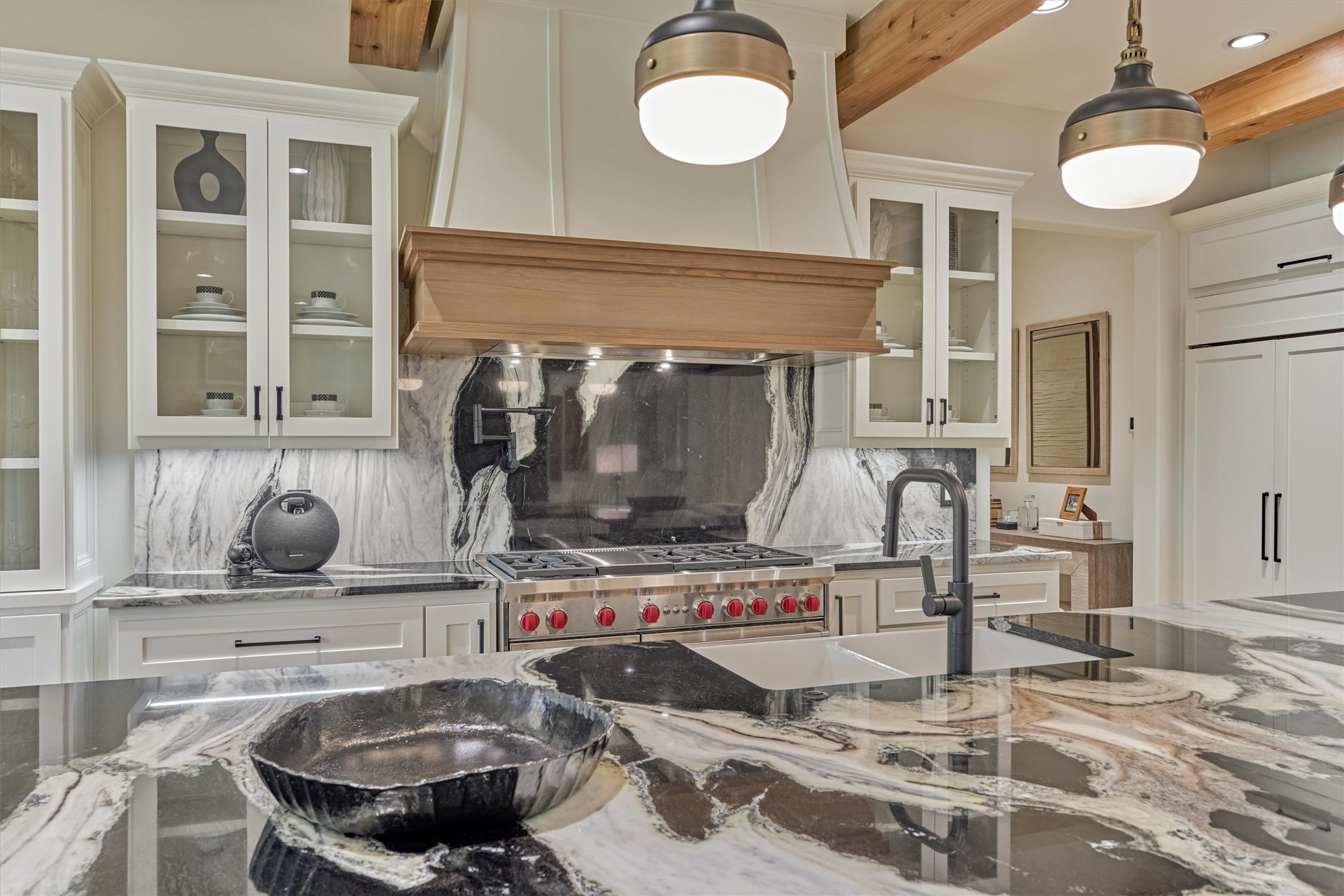 4469 Lily Bean Road Montgomery, TX 77316 - Photo 16 of 50 a kitchen with a stove and a cabinets