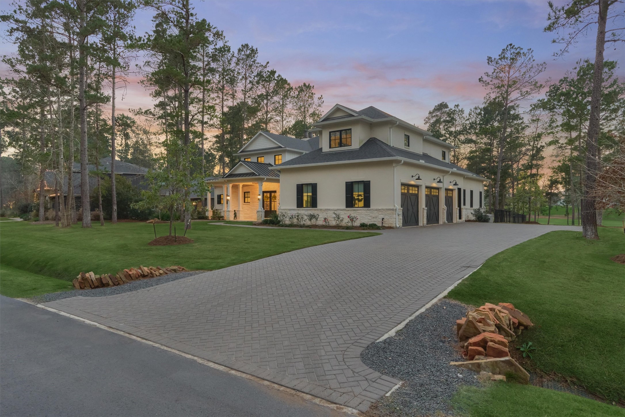 4469 Lily Bean Road Montgomery, TX 77316 - Photo 2 of 50 a front view of a house with a garden and trees