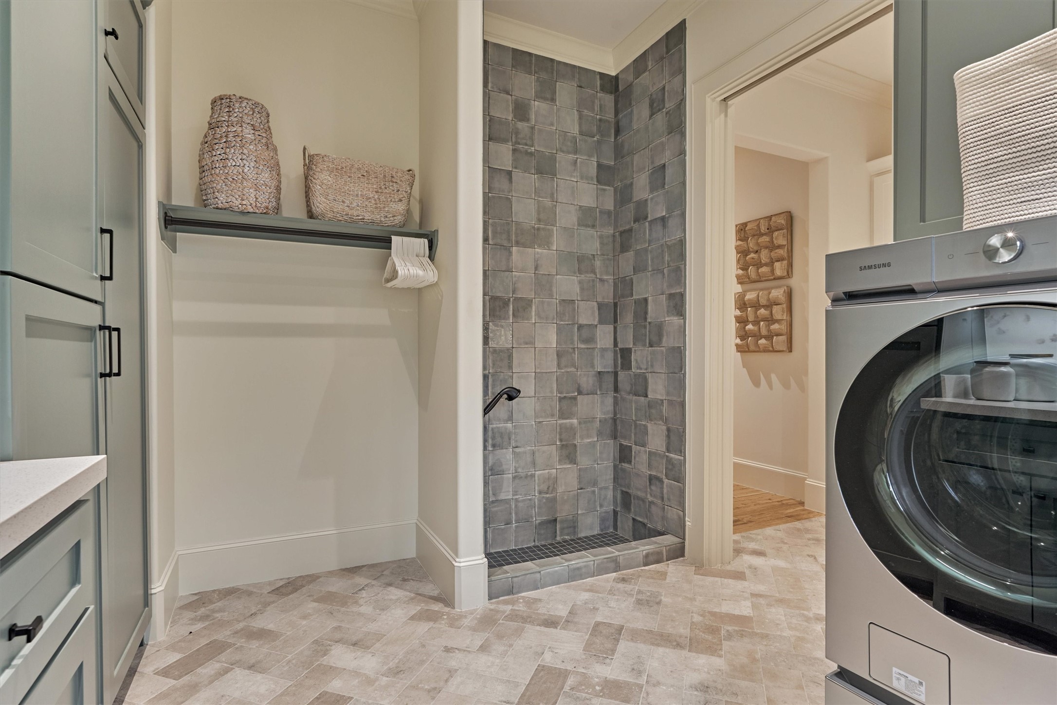 4469 Lily Bean Road Montgomery, TX 77316 - Photo 26 of 50 a view of a bathroom with a sink and a washer dryer