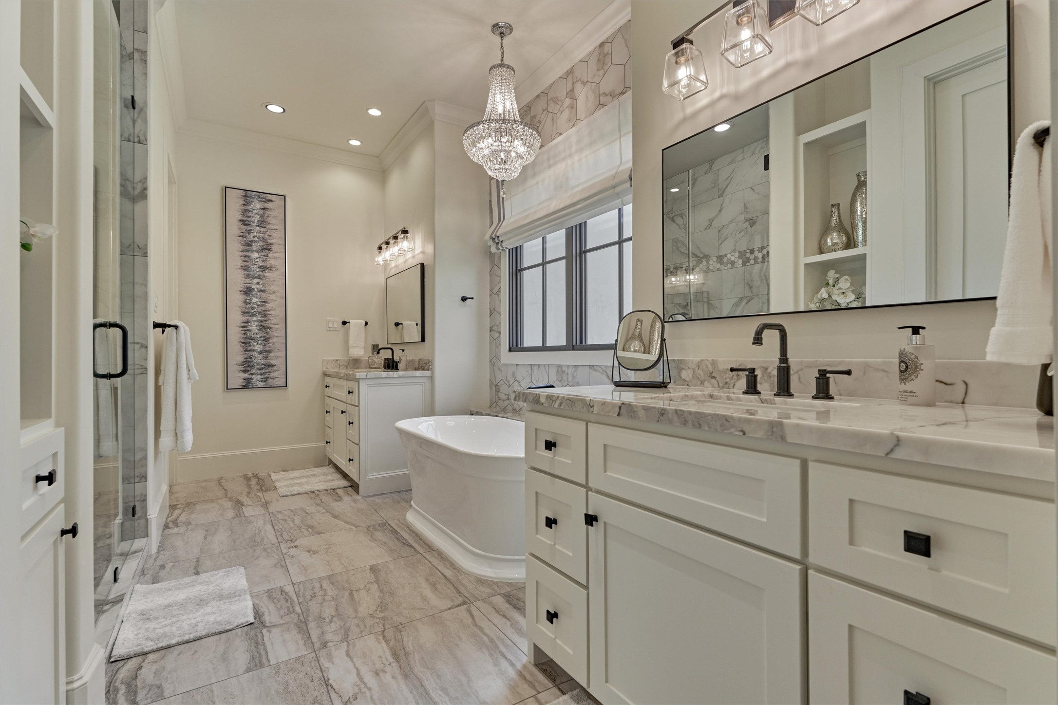 4469 Lily Bean Road Montgomery, TX 77316 - Photo 29 of 50 a spacious bathroom with a double vanity sink mirror double and shower