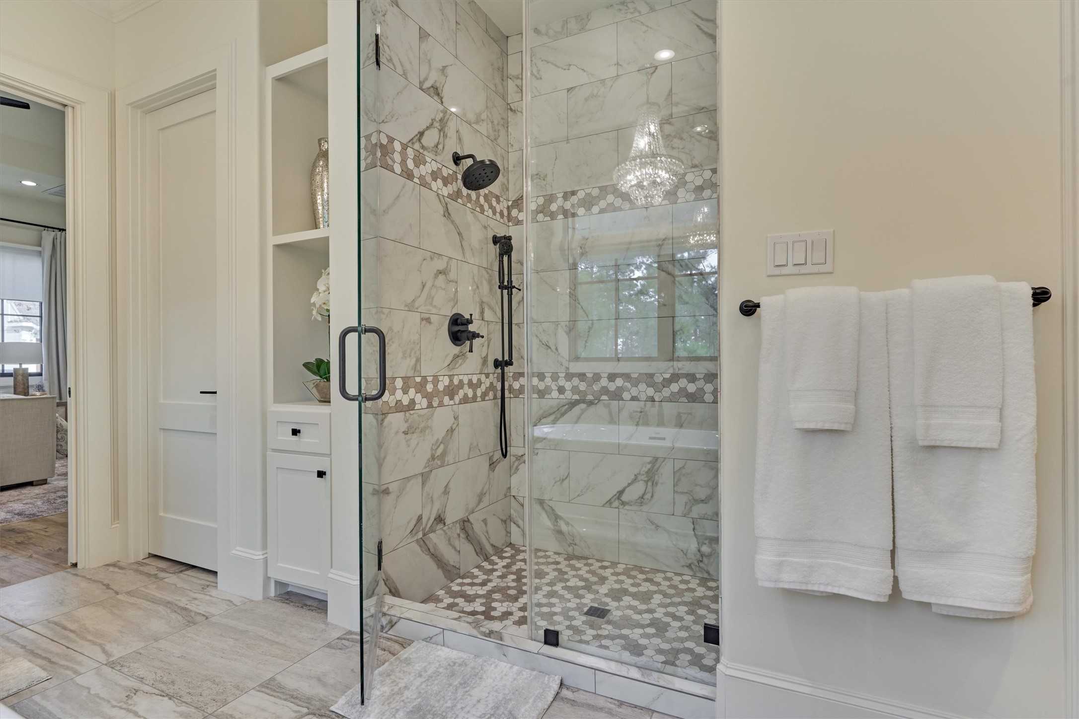 4469 Lily Bean Road Montgomery, TX 77316 - Photo 30 of 50 a bathroom with a glass shower door