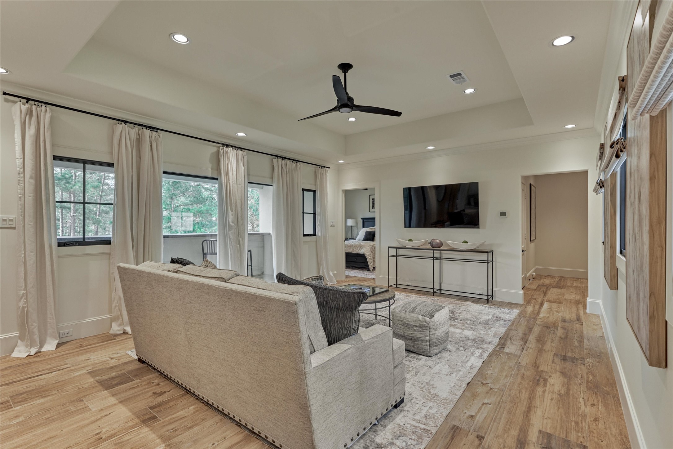 4469 Lily Bean Road Montgomery, TX 77316 - Photo 31 of 50 a living room with furniture and a flat screen tv