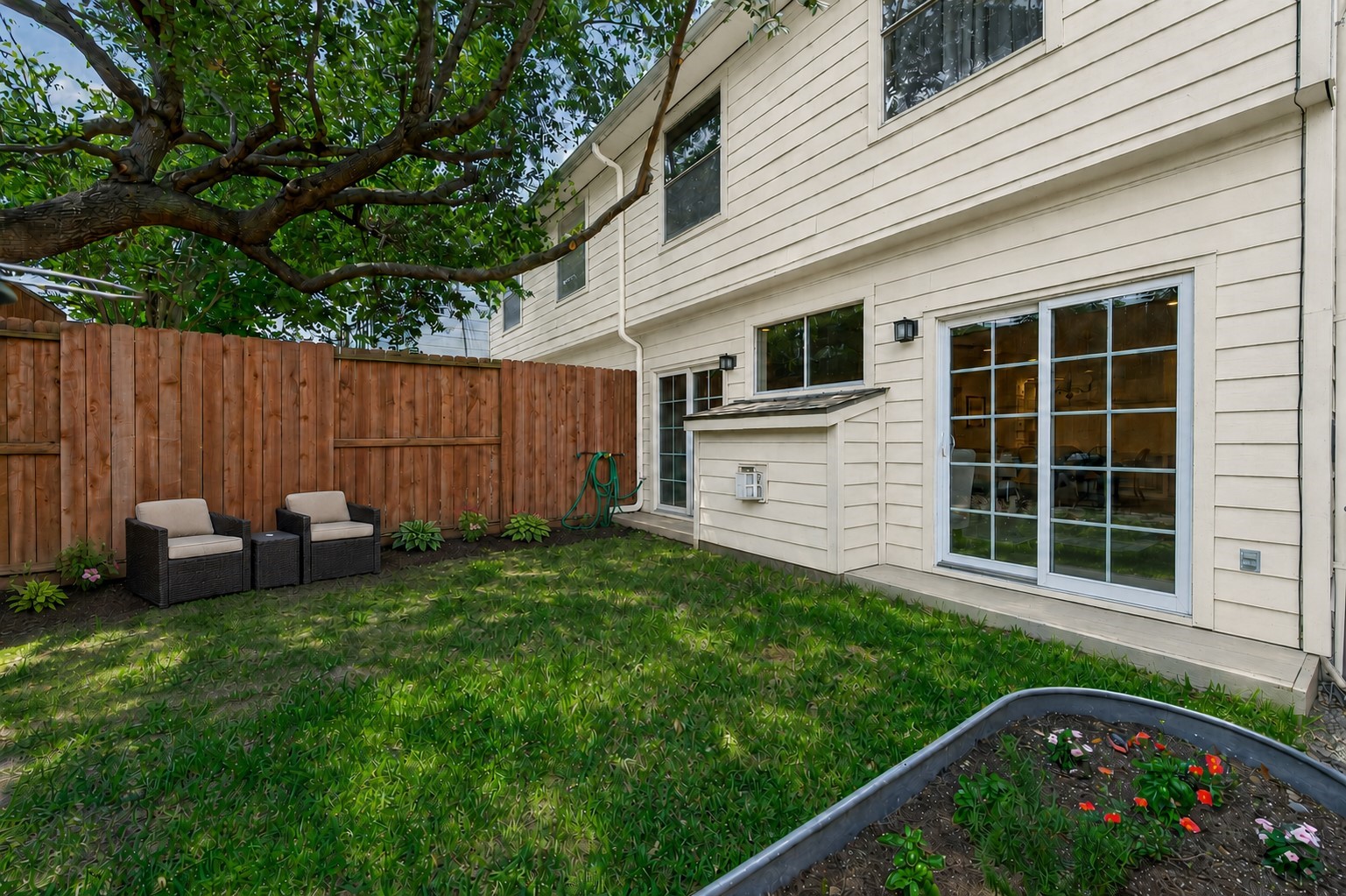 5011 Inker Street Houston, TX 77007 - Photo 2 of 21 Nice Private yard with
12 ft back fence, garden and beautiful live oak tree.