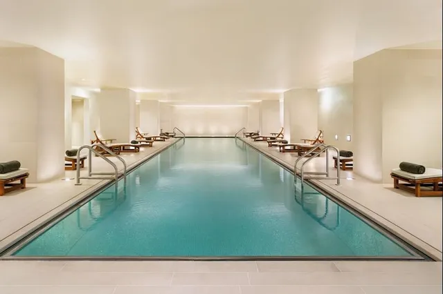 a bathroom with a sink and a large mirror