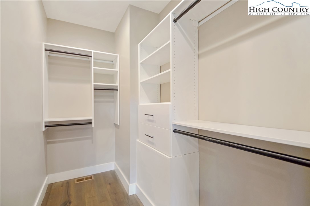 1736 Twin Rivers Drive Boone, NC 28607 - Photo 21 of 46 a view of walk in closet with empty racks