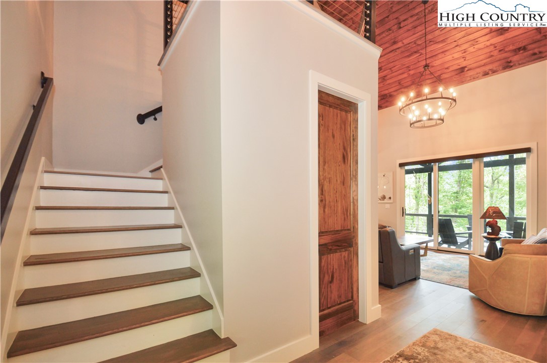 1736 Twin Rivers Drive Boone, NC 28607 - Photo 23 of 46 a view of a living room and entry way