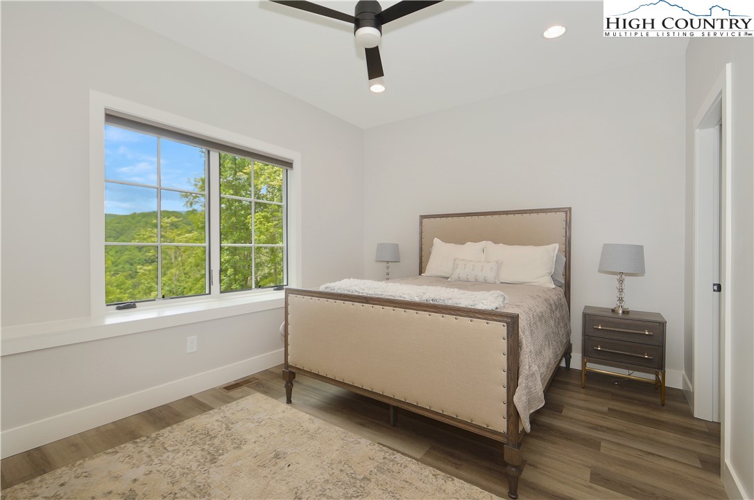 1736 Twin Rivers Drive Boone, NC 28607 - Photo 33 of 46 a room with a bed and windows