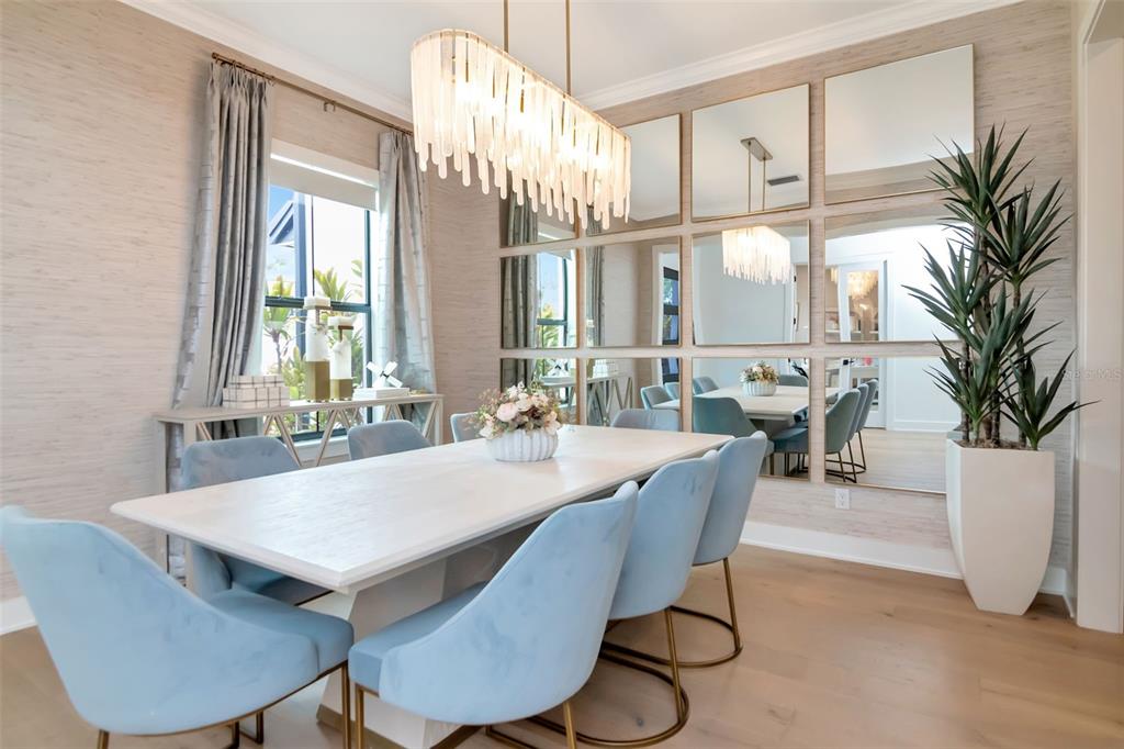 4111 West Swann Avenue Tampa, FL 33609 - Photo 21 of 49 a view of a a dining room with furniture window and wooden floor