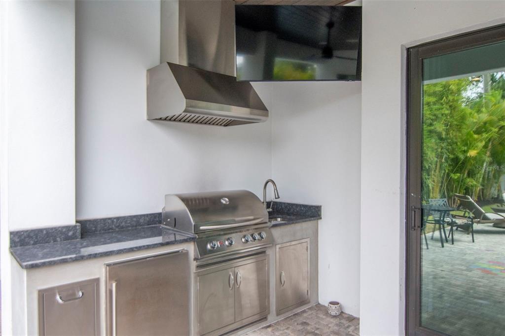 4111 West Swann Avenue Tampa, FL 33609 - Photo 42 of 49 a kitchen with a sink and cabinets