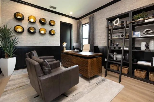 a living room with furniture a rug and a wooden floor