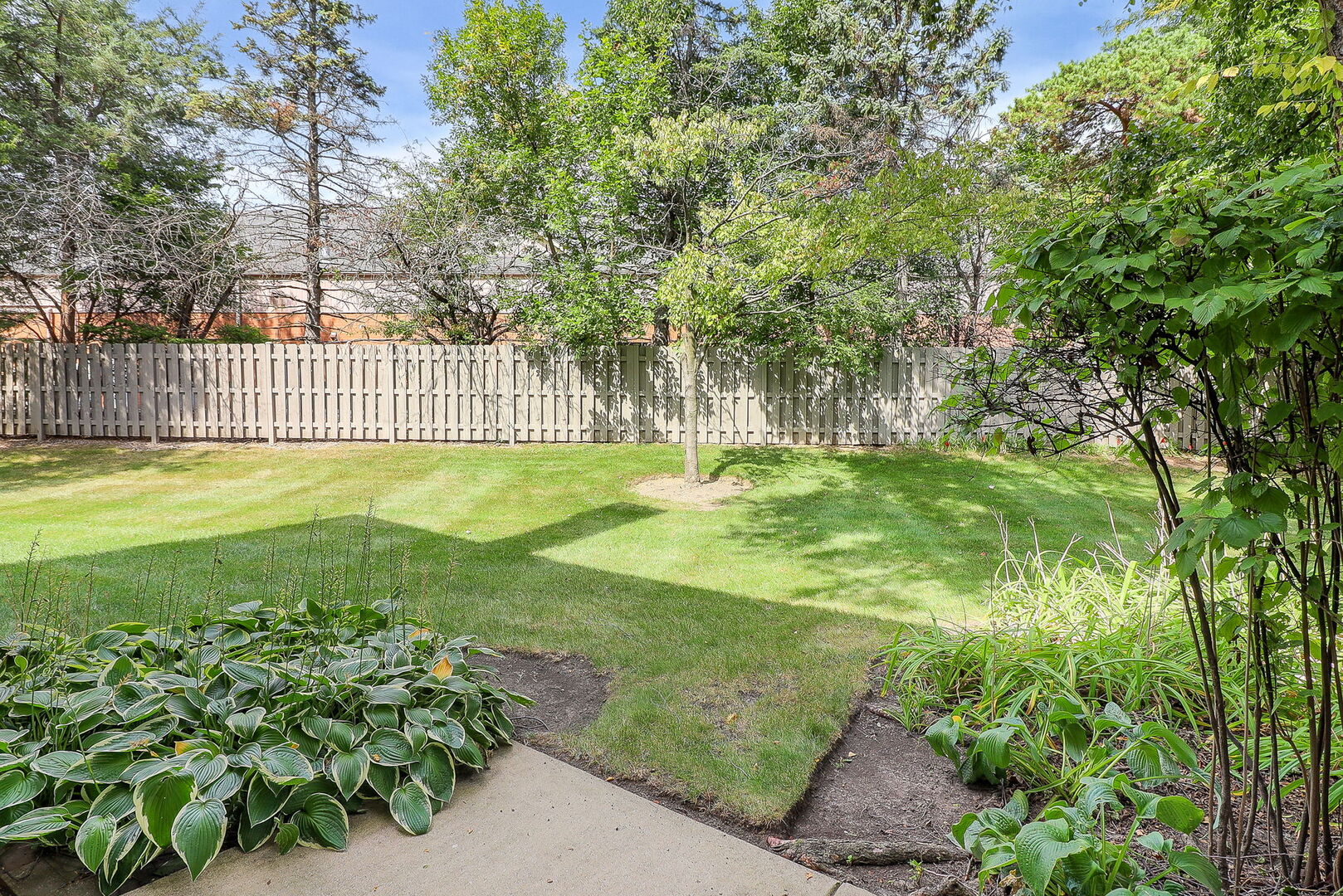 164 Springdale Lane Bloomingdale, IL 60108 - Photo 19 of 30 a view of a garden with an outdoor space