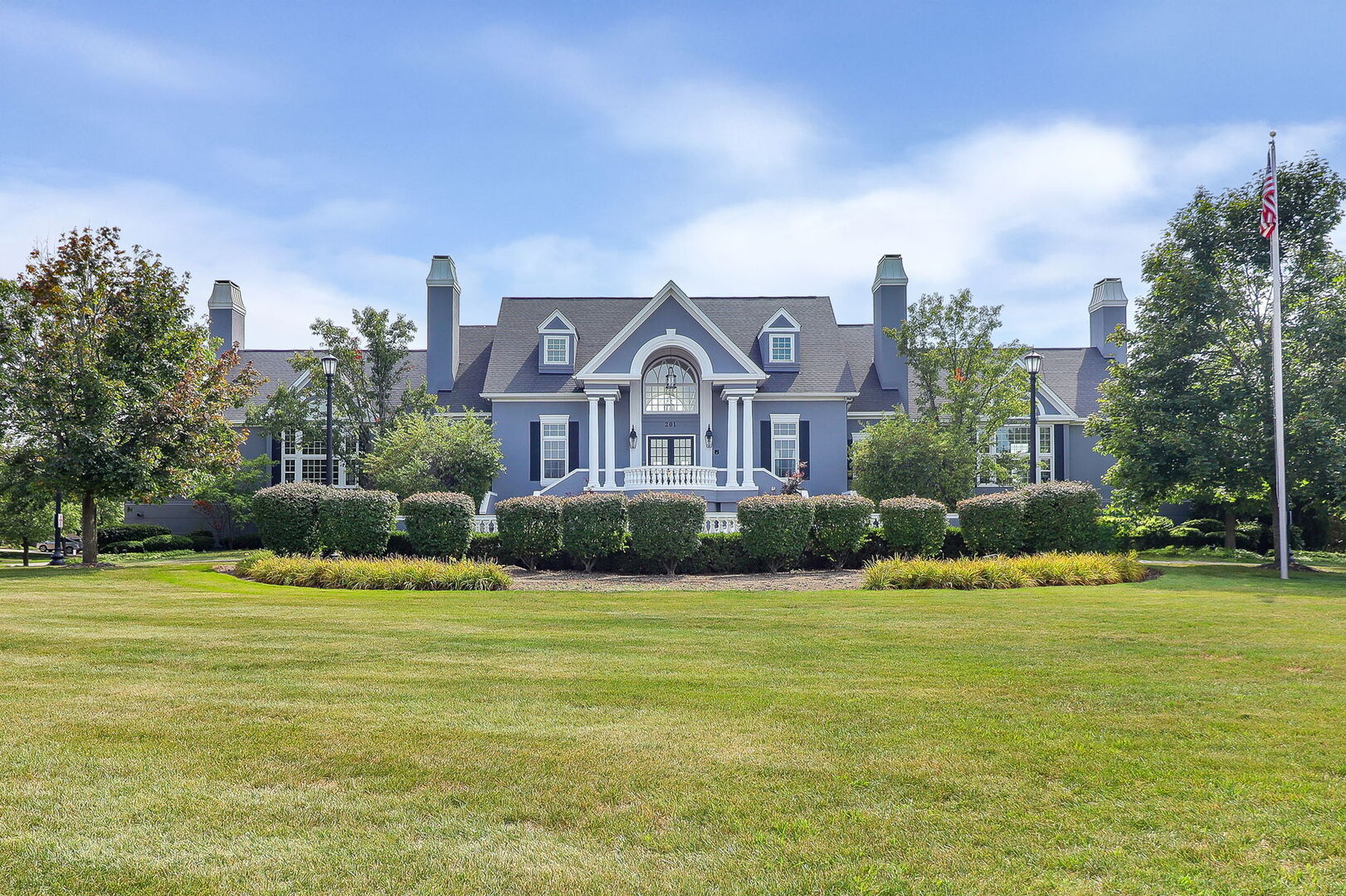 164 Springdale Lane Bloomingdale, IL 60108 - Photo 22 of 30 a view of a big house with a big yard and palm trees
