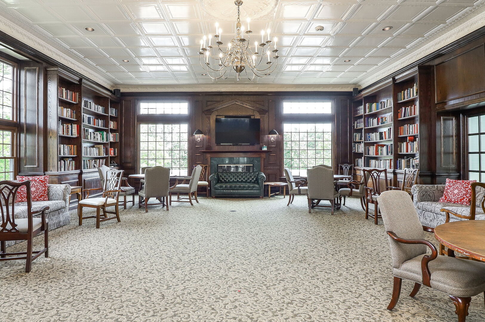 164 Springdale Lane Bloomingdale, IL 60108 - Photo 23 of 30 a living room with furniture and a fireplace