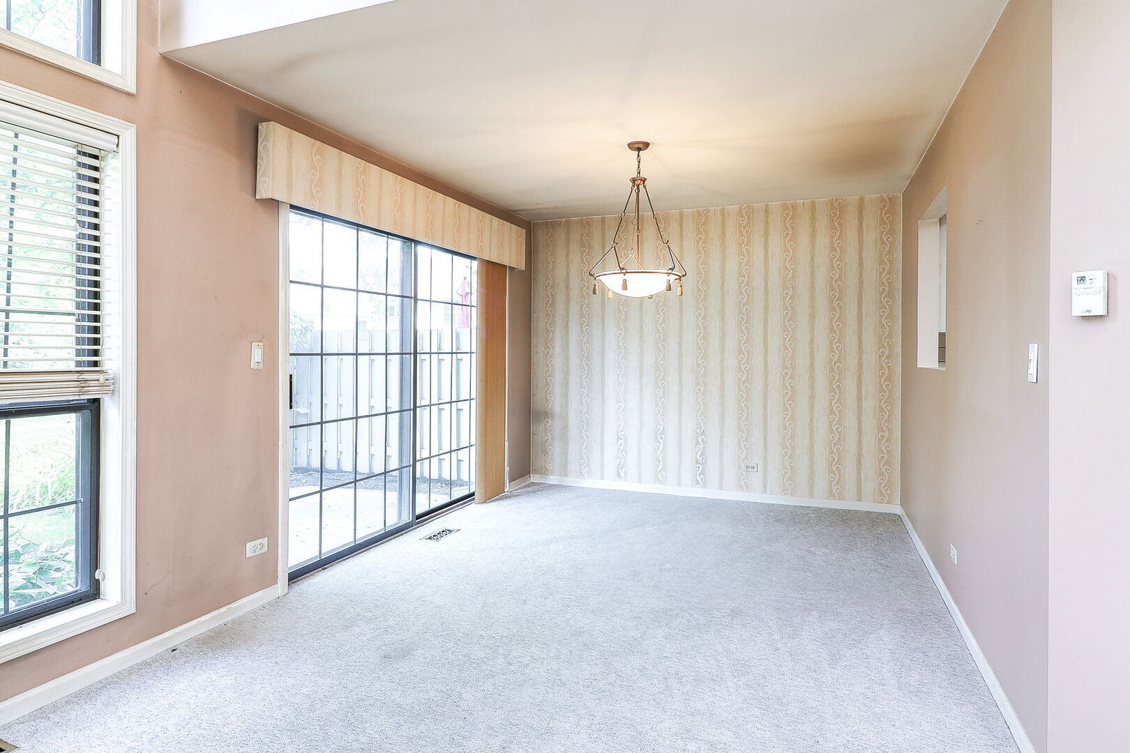 164 Springdale Lane Bloomingdale, IL 60108 - Photo 6 of 30 a view of an empty room with a window