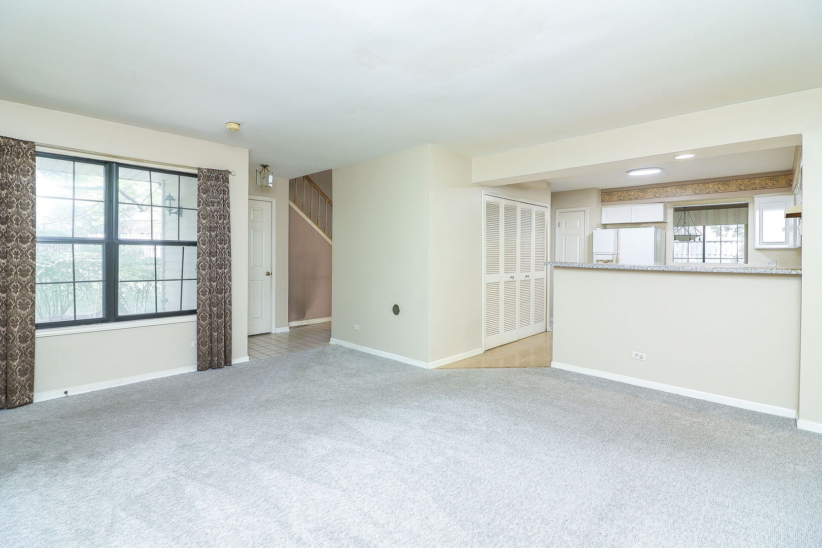 164 Springdale Lane Bloomingdale, IL 60108 - Photo 10 of 30 a view of an empty room with a window