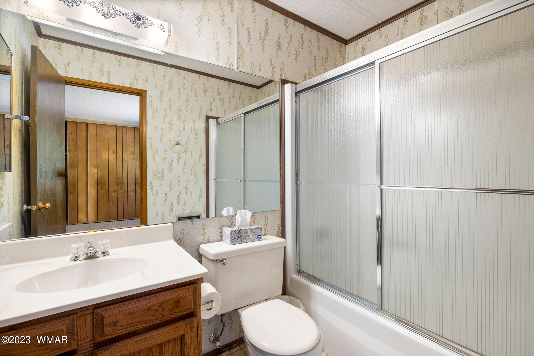7 County Road 2043 Alpine, AZ 85920 - Photo 20 of 32 a bathroom with a sink a toilet and shower