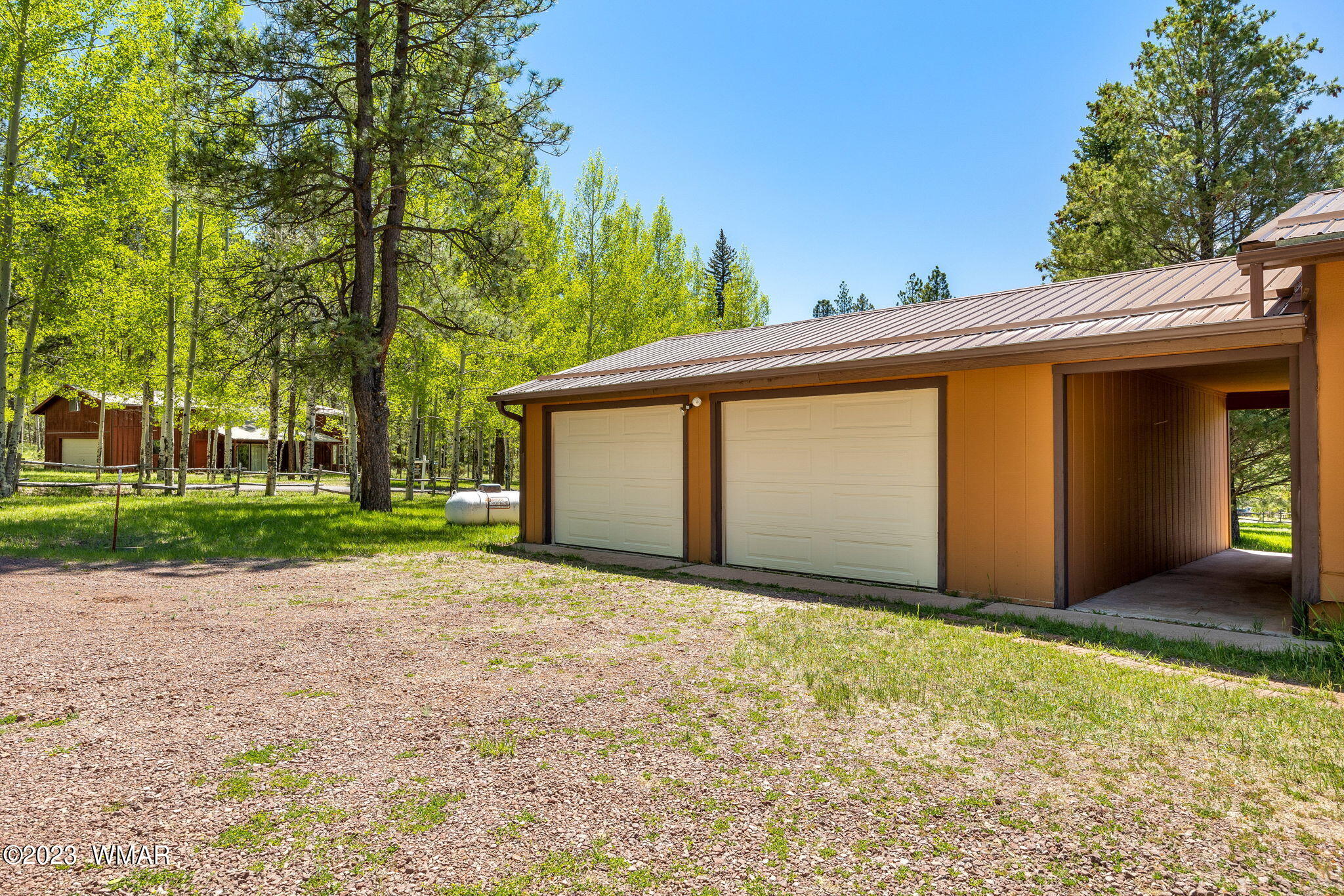 7 County Road 2043 Alpine, AZ 85920 - Photo 23 of 32 a backyard of a house with lots of green space