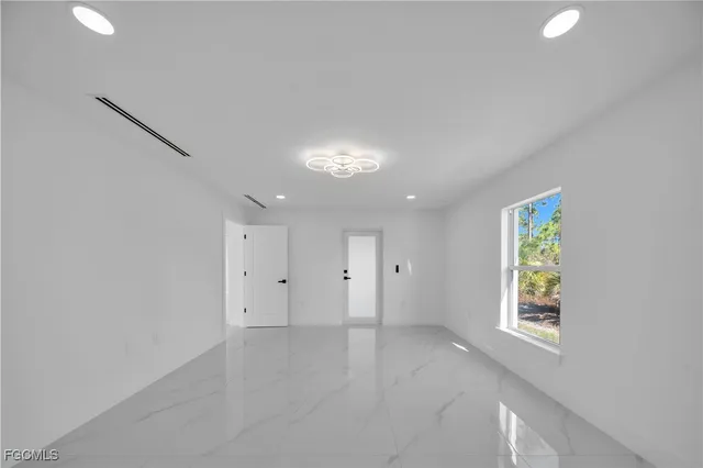 $279,900 | 855 Foxtail Street East, Lehigh Acres, FL 33974