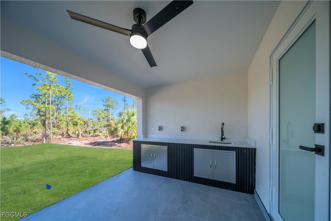 855 Foxtail Street East Lehigh Acres, FL 33974 - Photo 16 of 23 a view of a room with a large window