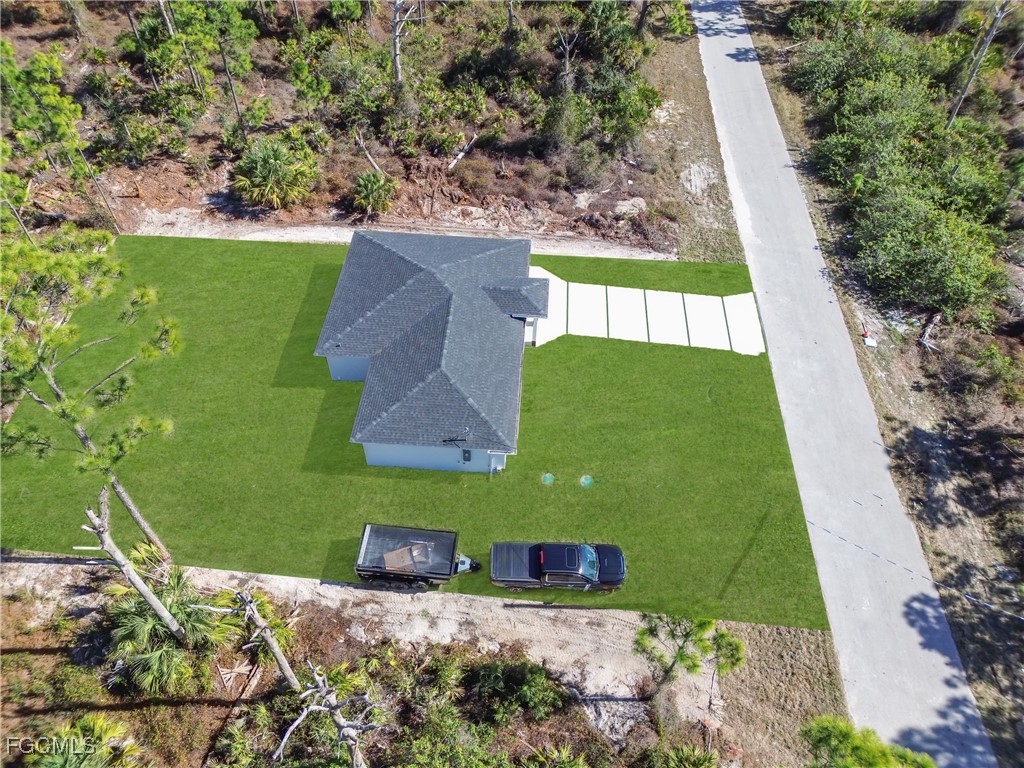 855 Foxtail Street East Lehigh Acres, FL 33974 - Photo 20 of 23 an aerial view of a house