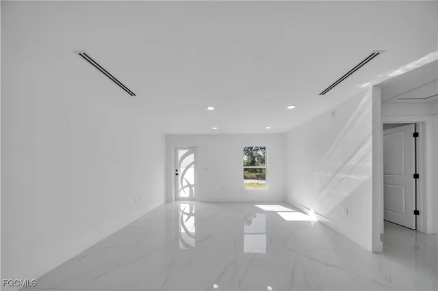 $279,900 | 855 Foxtail Street East, Lehigh Acres, FL 33974