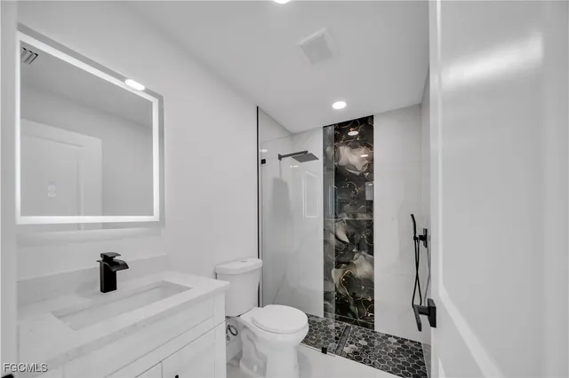 $279,900 | 855 Foxtail Street East, Lehigh Acres, FL 33974