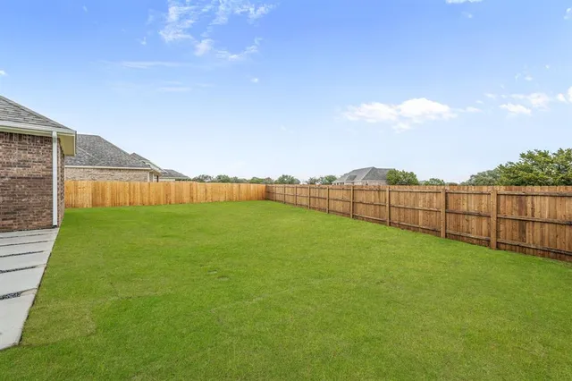 a view of an outdoor space and a yard