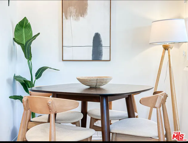 a view of a workspace with furniture