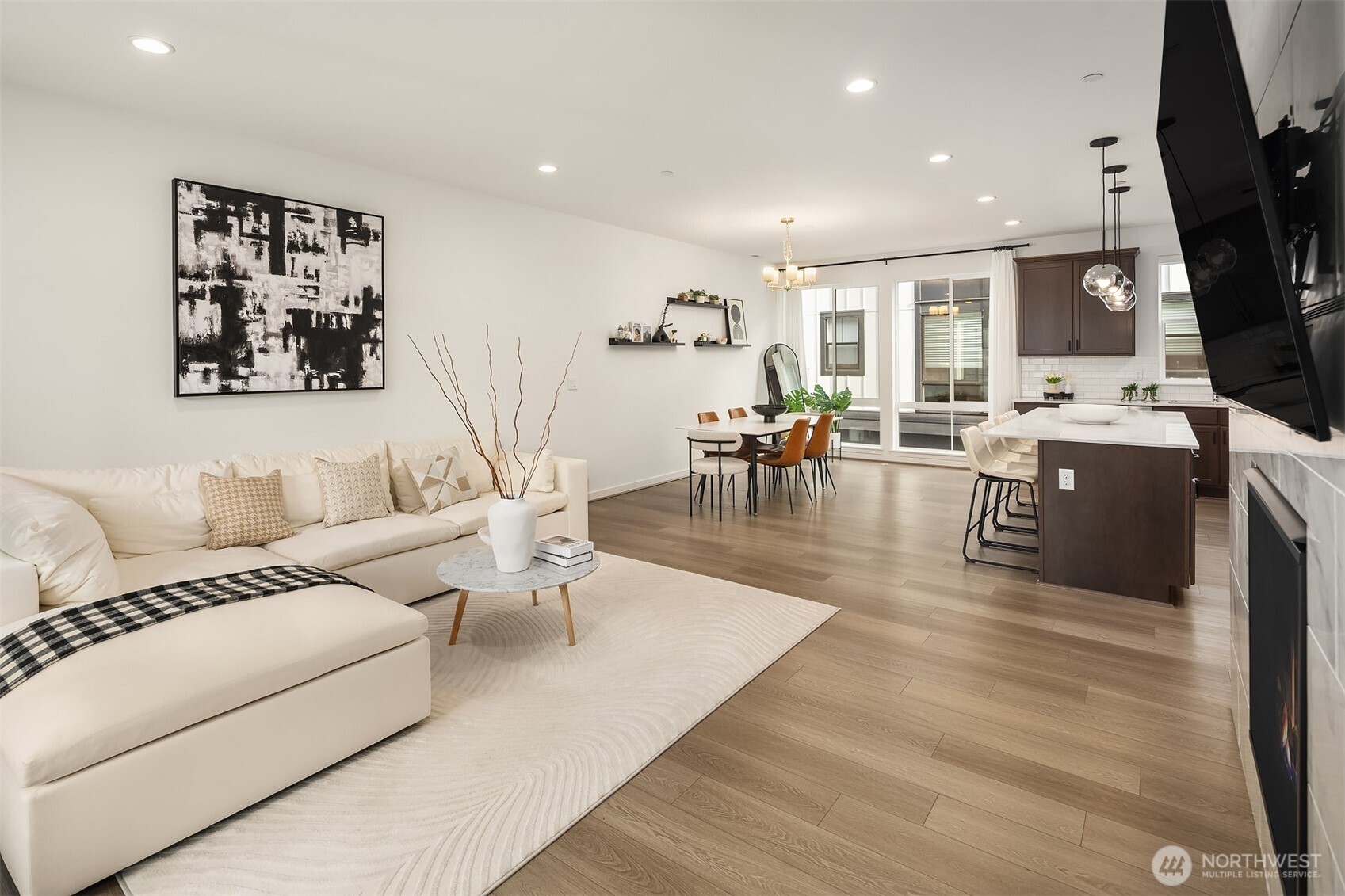 21822 25th Avenue Southeast, Unit B Bothell, WA 98021 - Photo 14 of 34 a living room with furniture wooden floor and a flat screen tv