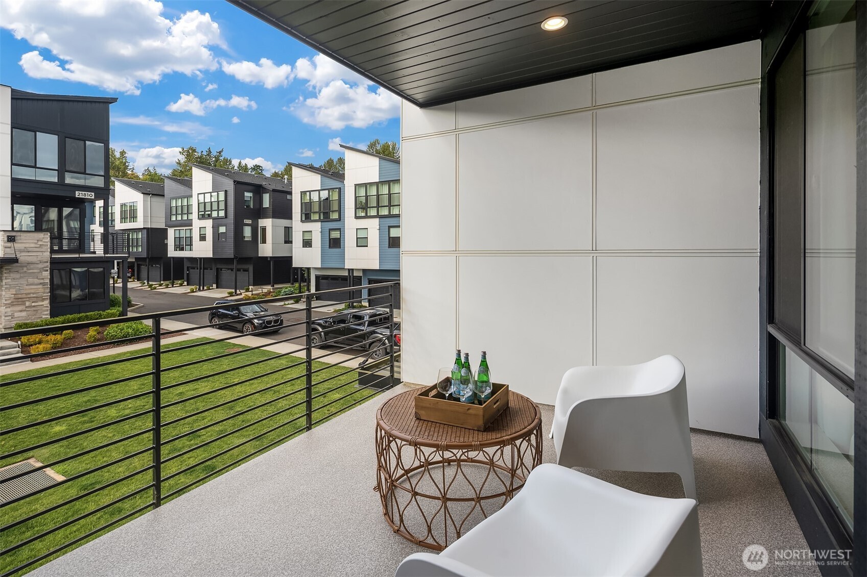 21822 25th Avenue Southeast, Unit B Bothell, WA 98021 - Photo 16 of 34 a balcony with furniture and a potted plant