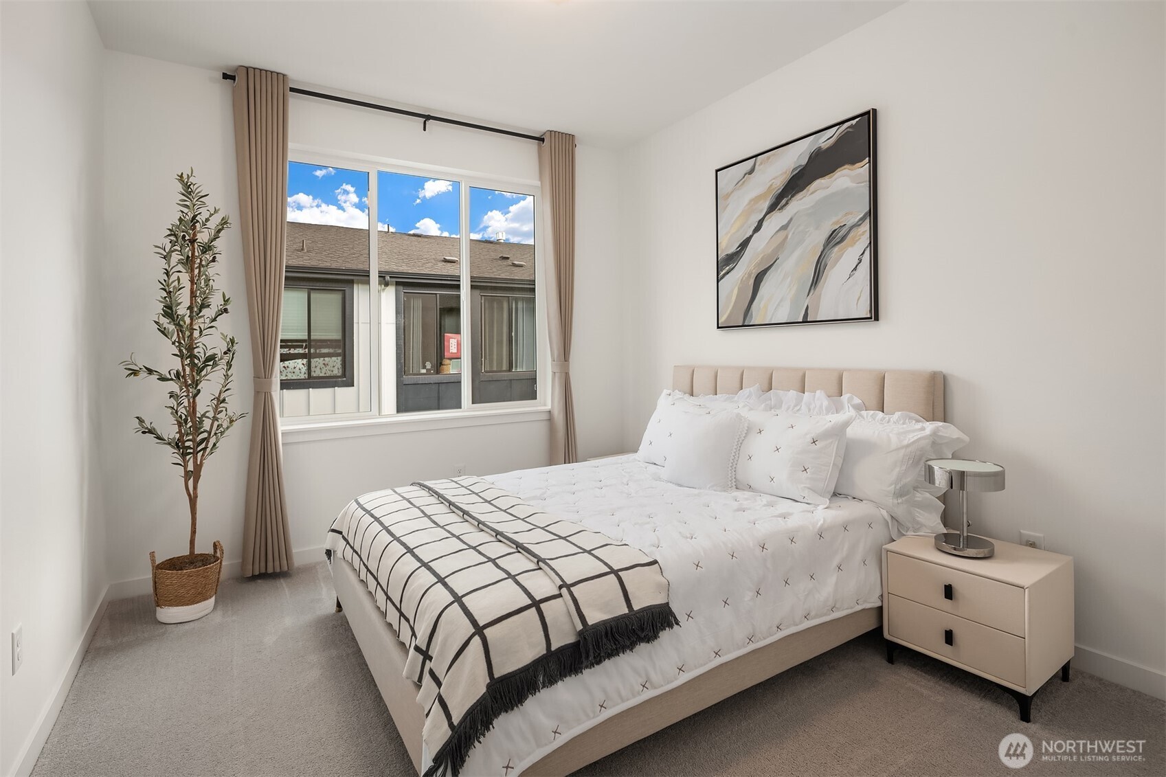 21822 25th Avenue Southeast, Unit B Bothell, WA 98021 - Photo 24 of 34 a bedroom with a bed and a window