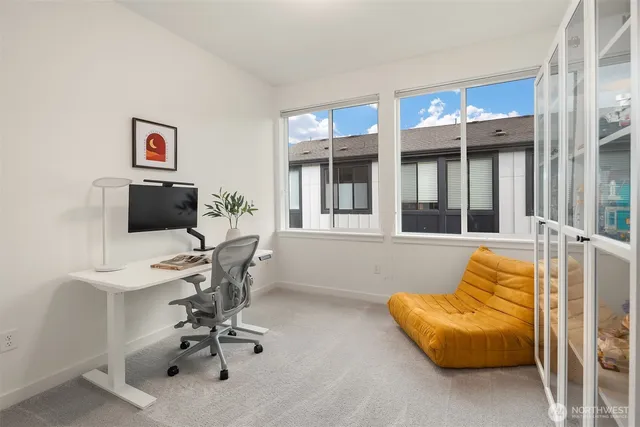 a workspace with furniture and a couch