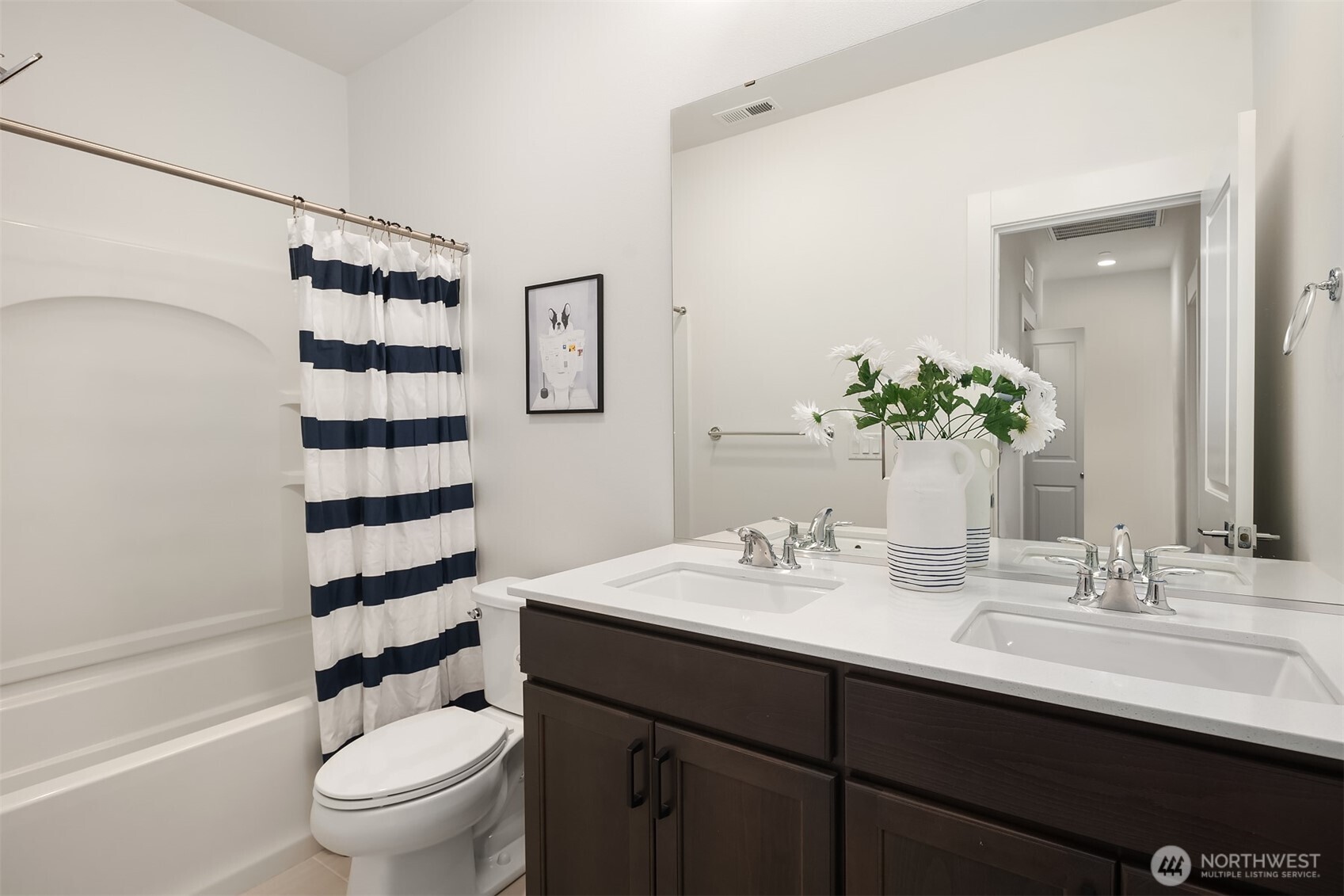 21822 25th Avenue Southeast, Unit B Bothell, WA 98021 - Photo 26 of 34 a bathroom with a sink a toilet a shower and a mirror