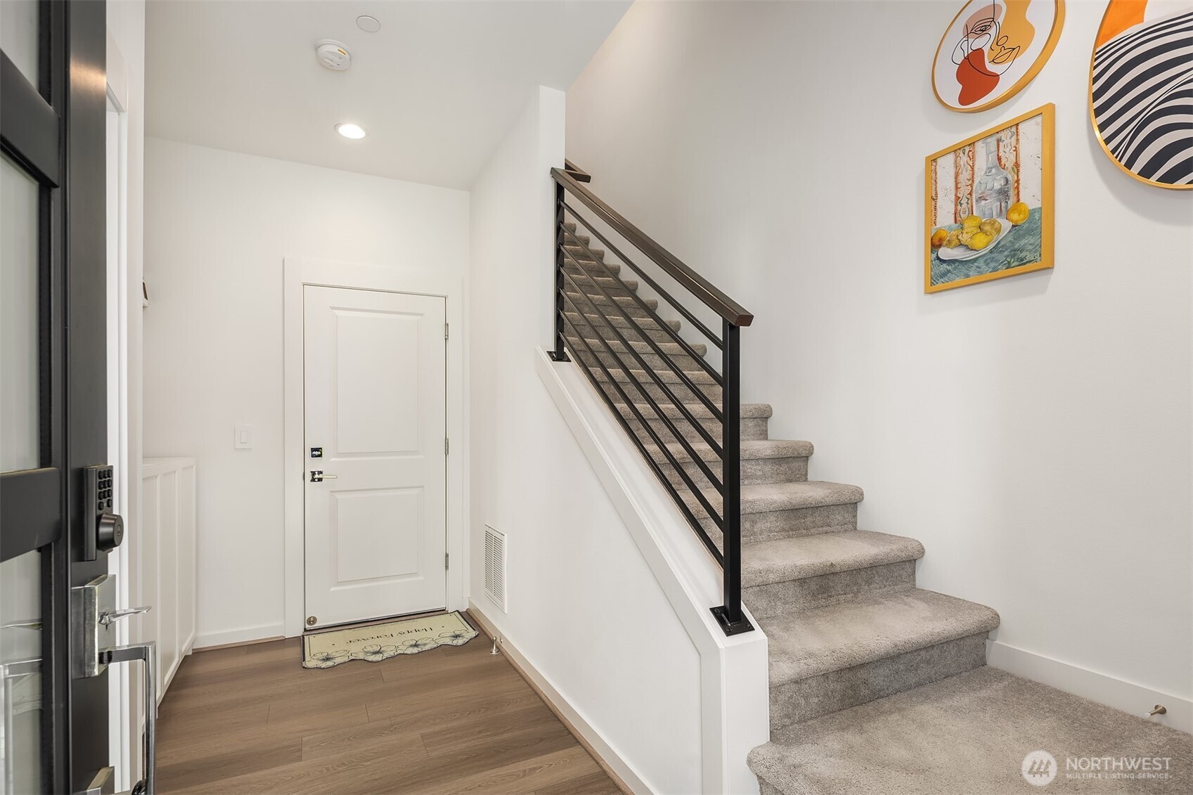 21822 25th Avenue Southeast, Unit B Bothell, WA 98021 - Photo 30 of 34 a view of entryway and hall with wooden floor