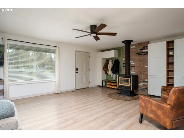 a living room with furniture and a window