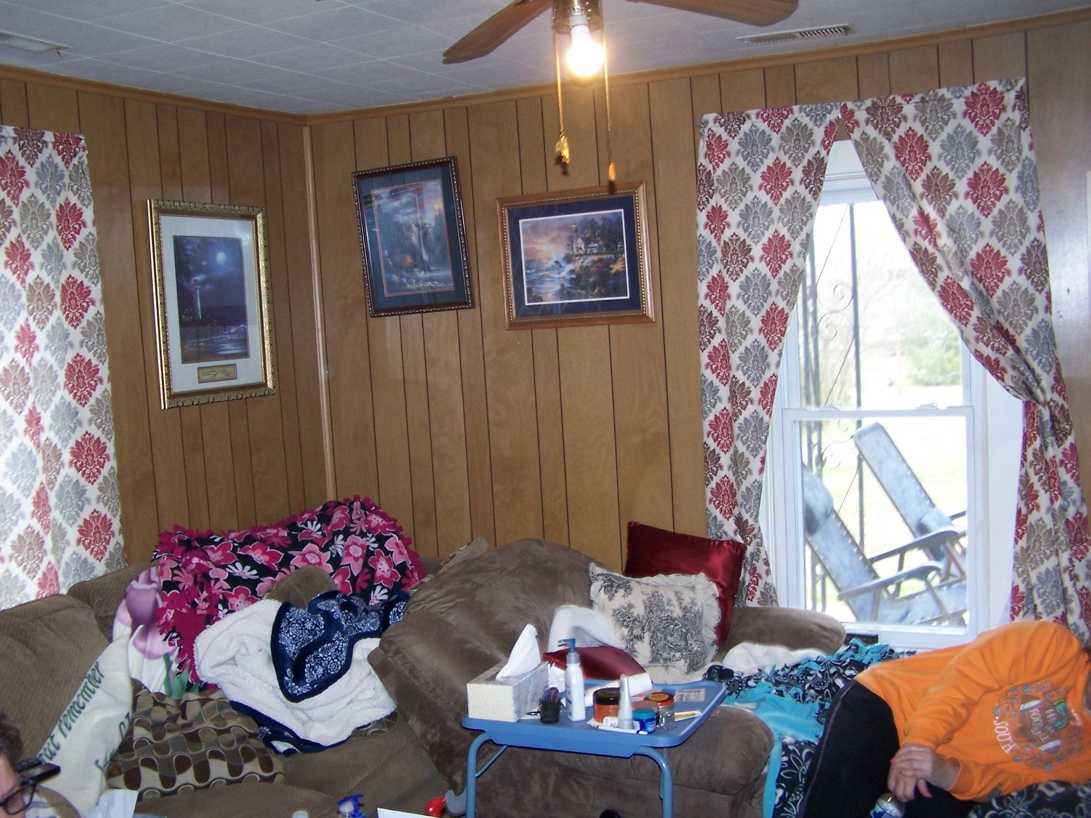 914 Bethel Road Pulaski, TN 38478 - Photo 14 of 15 a bedroom with a bed and a chandelier