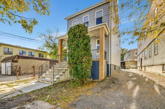 a view of a building with a street