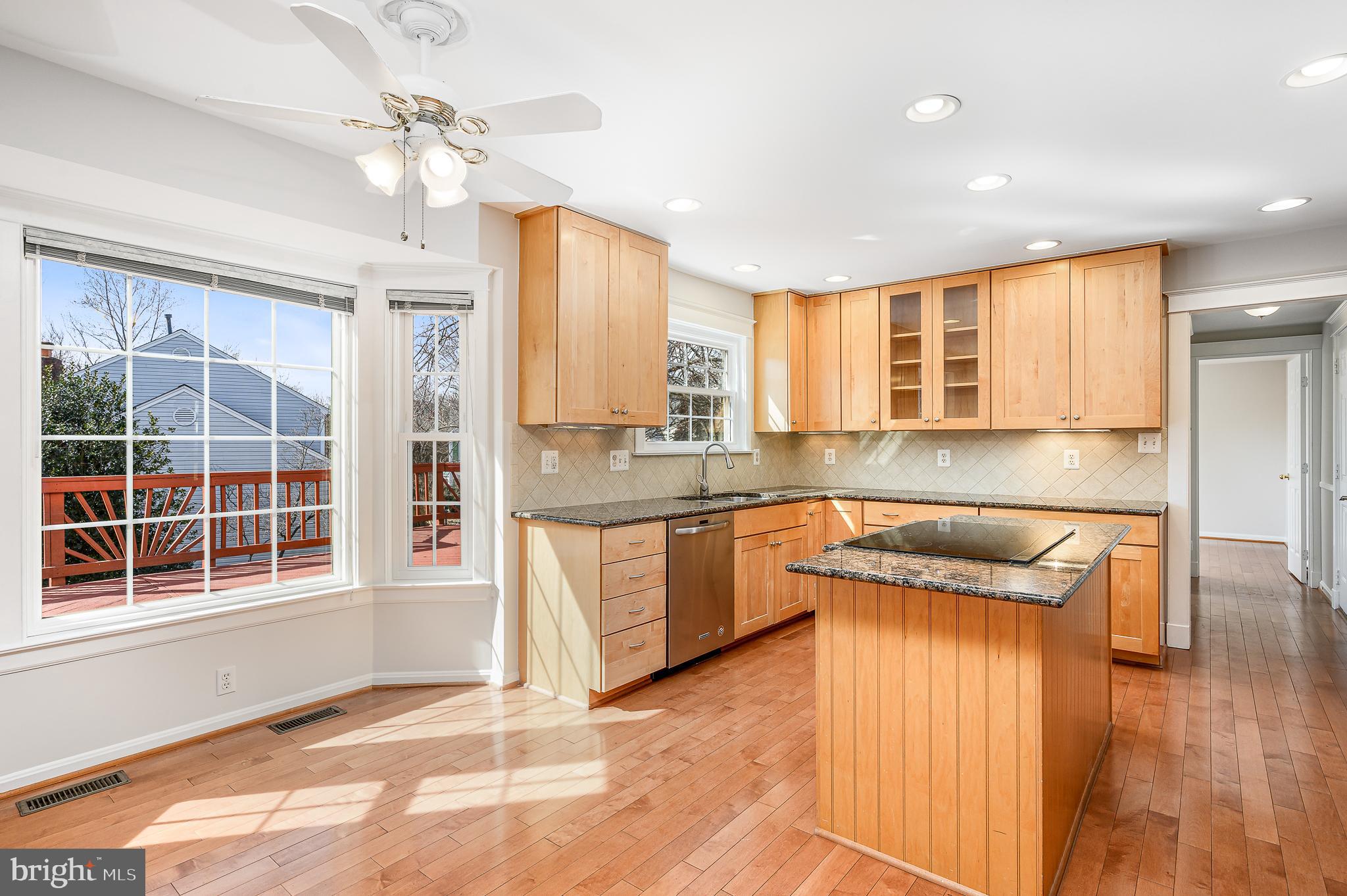 43356 Wayside Circle Ashburn, VA 20147 - Photo 22 of 52 a kitchen with a refrigerator and a sink