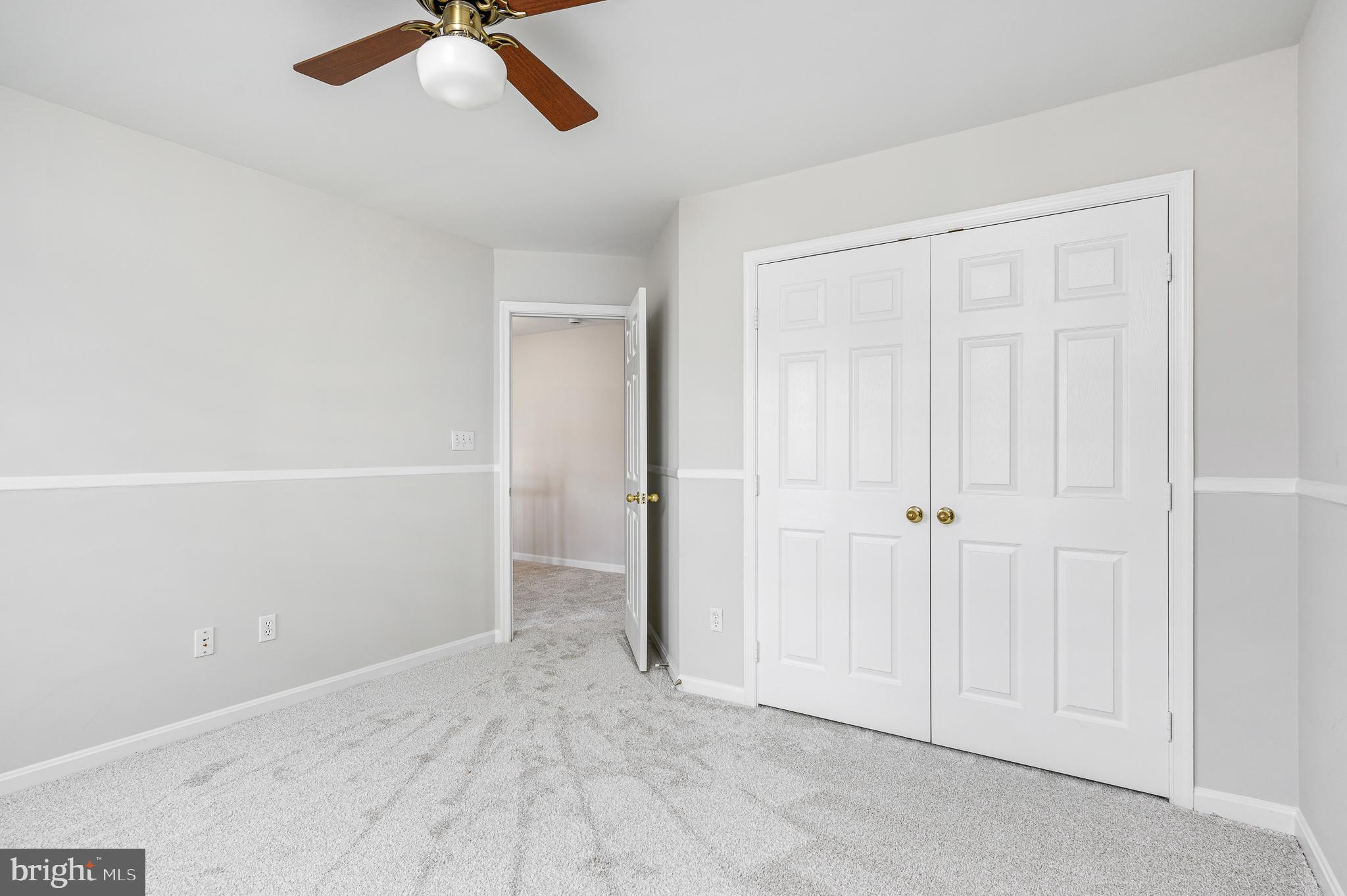 43356 Wayside Circle Ashburn, VA 20147 - Photo 37 of 52 an empty room with a empty space and a ceiling fan