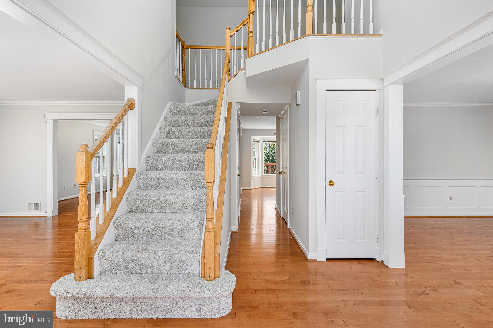 43356 Wayside Circle Ashburn, VA 20147 - Photo 9 of 52 a view of entryway and hall with wooden floor