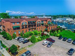 17 Water Street, Unit A10 Groton, CT 06355 - Photo 27 of 35 an aerial view of a house with a garden and plants
