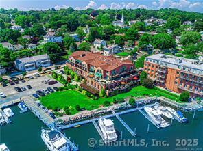 17 Water Street, Unit A10 Groton, CT 06355 - Photo 29 of 35 an aerial view of a house with a garden and swimming pool