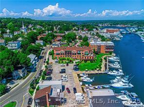 17 Water Street, Unit A10 Groton, CT 06355 - Photo 30 of 35 an aerial view of residential houses with outdoor space and street view