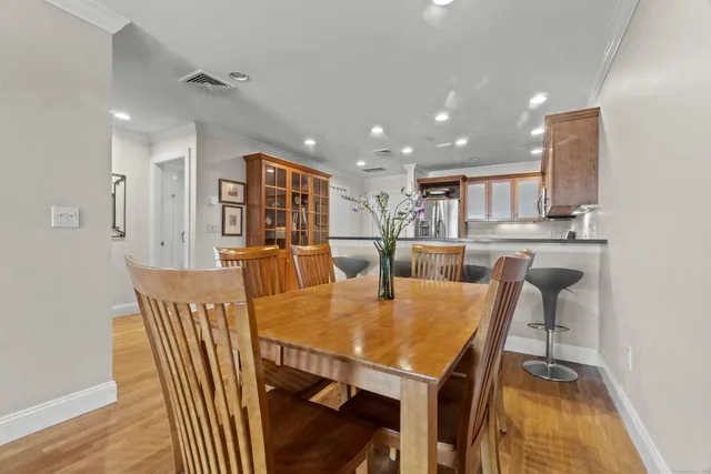 a balcony with tall trees