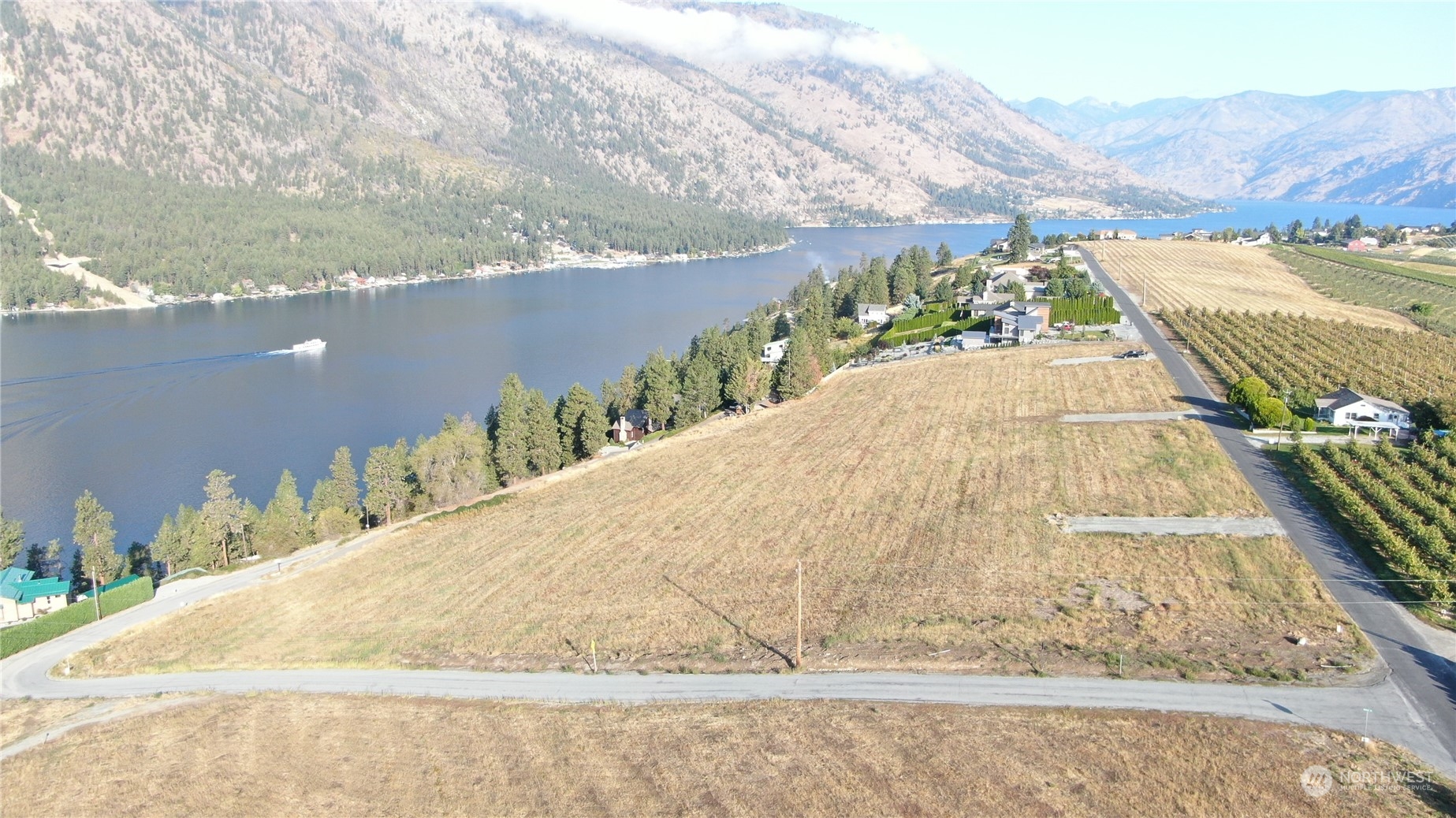 a view of balcony with wooden floor